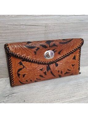 Vintage tooled leather turn lock wallet
